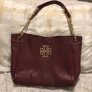 Tory Burch bag maroon or plum color approximately